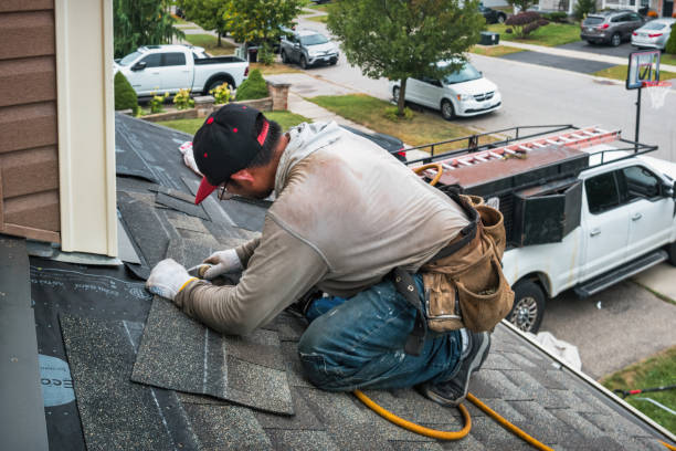 Professional Roofing technician working in Ashland, CA